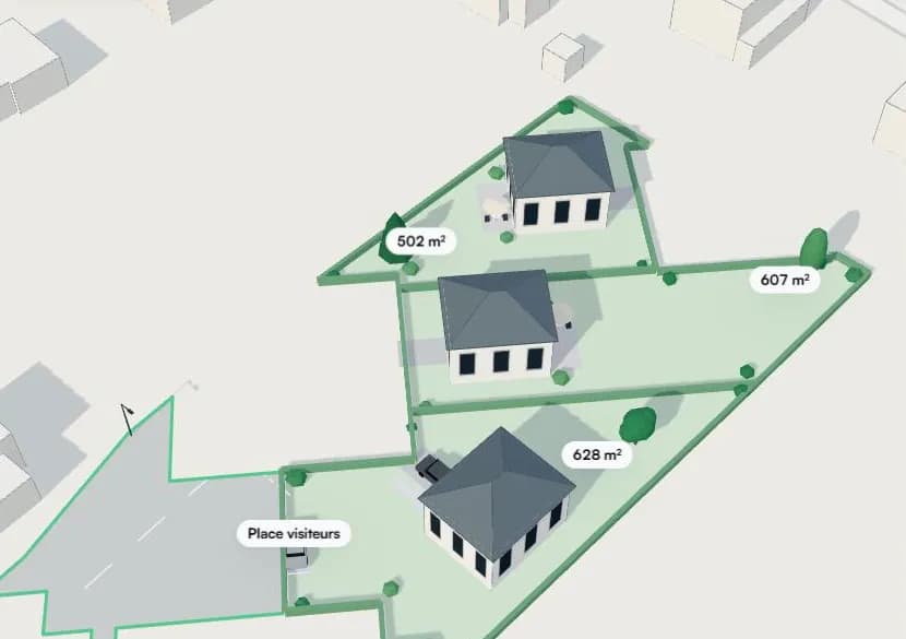 Vue 3D : trois terrains à bâtir autour d’une voie commune.